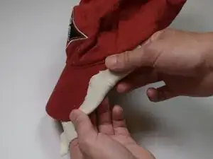 Patchwork Repair for a Damaged Hat