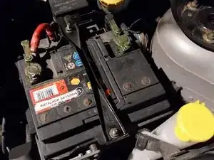 How to check the electrolyte level in a sealed, "maintenance free" battery