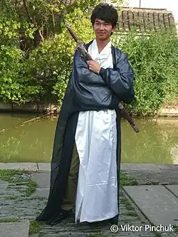 A guy in a traditional suit (China)