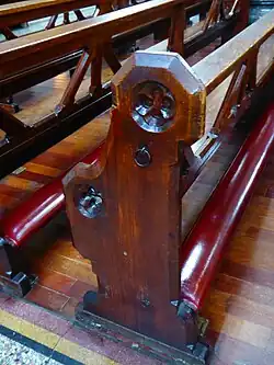 Pew (with Kneeler) - a long bench with a back, placed in rows in the main part of some churches to seat the laity