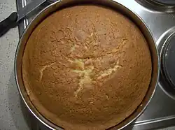 A cake in a round cake pan