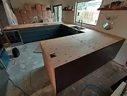 With all drawer fronts and doors installed