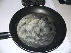 2. Melt butter in a large frying pan.