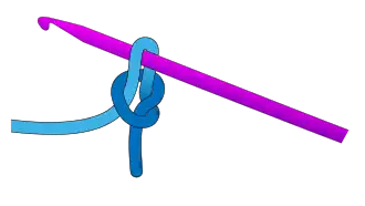 2. The completed first loop, with the base chain knot. From here you build your chain. You may wish to tighten the knot a bit manually.