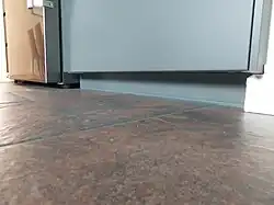 In the fridge/oven row, where we had to cut the legs to custom length, we had to cut the toe kicks, too.