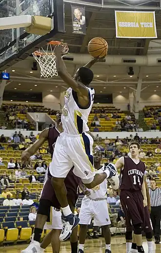 A slam dunk in basketball. It's impossible to miss with a slam dunk, so it makes success a certainty.