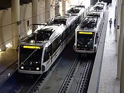 Two Gold Line trains at Memorial Park Station, one of 3 below-grade stations.