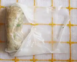 Make the second fold in the sides.