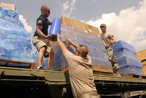 National Guardsmen deliver water to Toledo Residents.