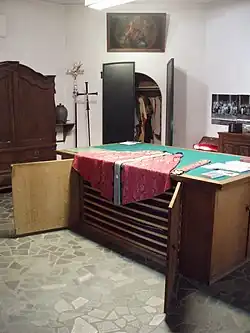 Sacristy - A room in a church where sacred vessels, books, vestments, etc. are kept. Sometimes also used by clergy to prepare for worship or for meetings