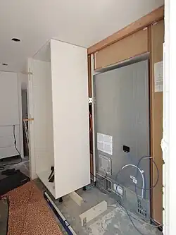 The first cabinet in the other row