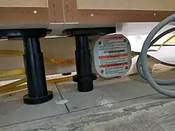 An island support bracket makes a great base, too, for elements like a junction box or an electrical outlet for a built-in appliance.