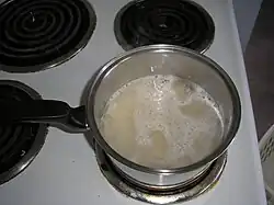 6. Wait until water begins to boil.