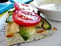 Tomato, avocado and cheese on wholegrain toast