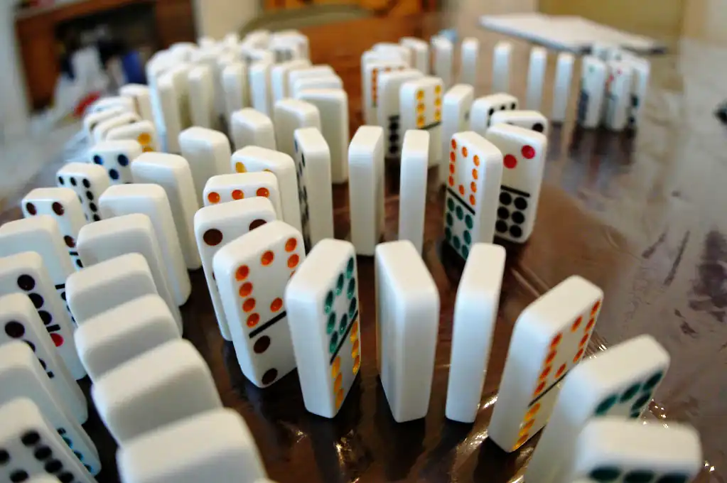 The induction principle is comparable to a domino series.