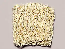 A block of instant ramen noodles