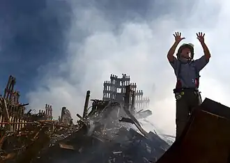 A fireman yelling for rescue workers.