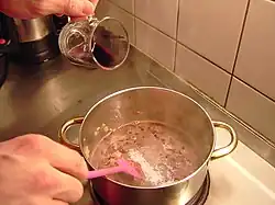 3. deglazing with red wine