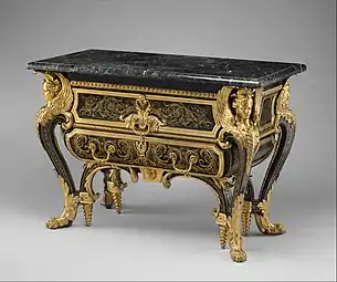 Commode; by André Charles Boulle; c.1710–1732; walnut veneered with ebony and marquetry of engraved brass and tortoiseshell, gilt-bronze mounts, antique marble top; 87.6 x 128.3 x 62.9&nbsp;cm; Metropolitan Museum of Art (New York City)