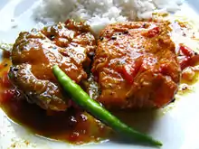 A traditional Bengali fish meal&nbsp;– Rice with Macher Jhol (Literally translated to "Fish's gravy")