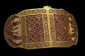 Shoulder-clasps from Sutton Hoo; early 7th century; gold, glass & garnet; length: 12.7&nbsp;cm; British Museum