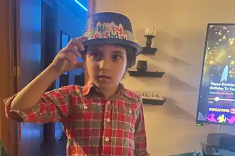 Вади аль-Фаюми отмечает свой шестой день рождения. Фотография сделана за несколько дней до убийства ребёнка