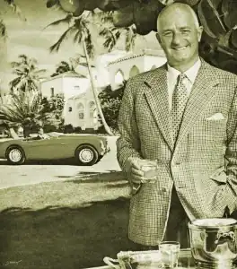 Пилот, автогонщик, конструктор на рекламном плакате одного из сортов виски. 1955 год.