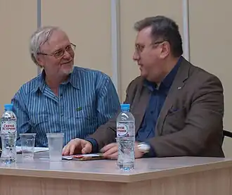 Профессор Леонов С. В. (слева) и ректор МПГУ Лубков А. В. в президиуме Международной конференции. МПГУ, 15.03.2019. (Фото М. А. Бабкина)