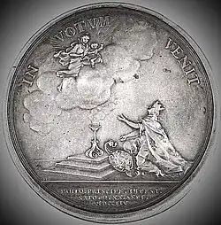 Медаль в честь рождения Павла I, на которой изображена коронованная женщина, символизирующая императорскую Россию и готовая принять от Гения новорождённого цесаревича. Надпись гласит: In votum venit («Вожделенный пришёл»)