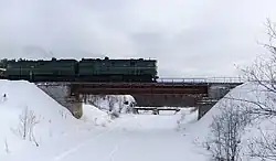 Железнодорожный мост через реку Ураим на участке между одноимённым разъездом и станцией Нязепетровская возле посёлка Ураимские Томилки (г. Нязепетровск)