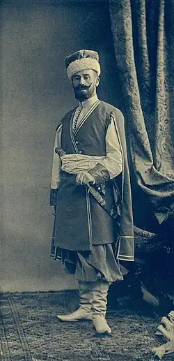 На костюмированном балу 1903 года в костюме есаула Сумского слободского казачьего полка 1651 года.