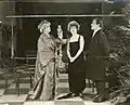 Слева направо: Айда Уотермен[англ.], Элси Фергюсон и Дэвид Пауэлл[англ.] в фильме «Дочь леди Роуз[англ.]» (1920)