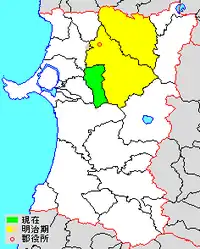 Расположение уезда Китаакита в префектуре Акита.зелёный — село Камикоани. Село составляет весь уезд Китаакита на сегодняшний день.жёлтый — города Одате и Китаакита ранее входившие в уезд