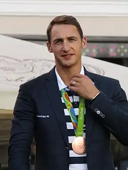 Рая со своей бронзовой олимпийской медалью