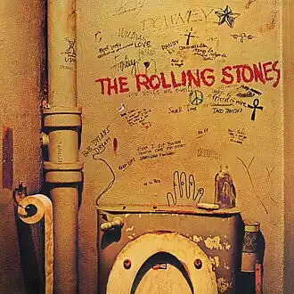 Обложка альбома The Rolling Stones «Beggars Banquet» (1968)