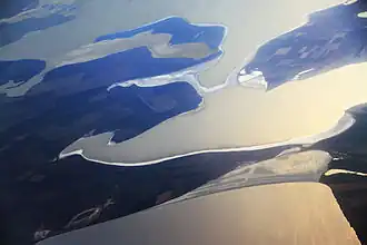 Северная часть Чонгарского полуострова, Соколовское озеро (на переднем плане). Вид с высоты 12000 м