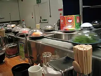 Суши-конвейер YO! Sushi[англ.] в Сохо