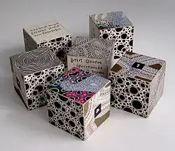 Михаил Молочников. Кубики Бога, 2006. Шесть кубиков в коробке. Картон, рисунок цветной тушью