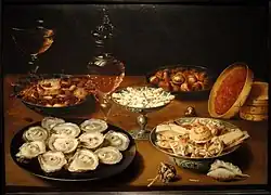 Натюрморт с устрицами, сладостями, каштанами и вином