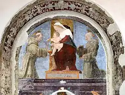 Мадонна с Младенцем и святыми Франциском и Бернардино. Деталь фрески церкви Сан-Франческо, Дерута