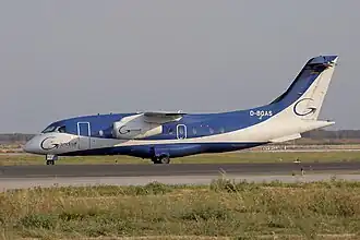 Dornier 328 в аэропорту Барселоны в 2003 году