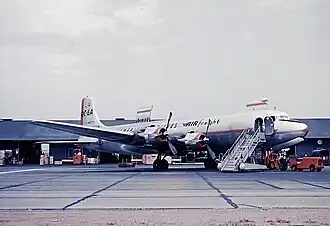 Борт N90779 в ещё грузовом варианте (DC-6A) в период работы в American Airlines