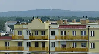 Вид холма Дзевича-Гура из познанского района Пёнтково. На вершине холма видна пожарная башня