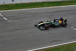 За рулем Lotus T128 на тестах Формулы-1 в Барселоне