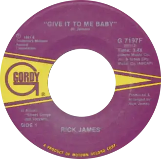 Обложка сингла Рика Джеймса «Give It to Me Baby» (1981)