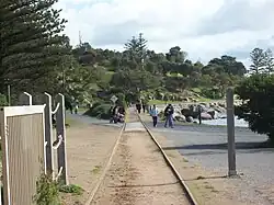 Конка по  выезде с конечной станции Гранитный остров. Вид на остров со станции.