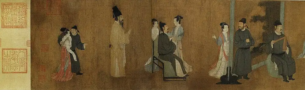 Одни из гостей флиртует с дамами, другой ведёт к гостям застеснявшуюся девушку.