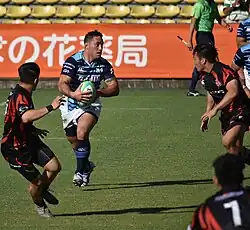 Хескет в игре за «Мунаката Саникс Блюз»