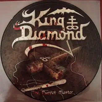 Обложка альбома King Diamond «The Puppet Master» (2003)