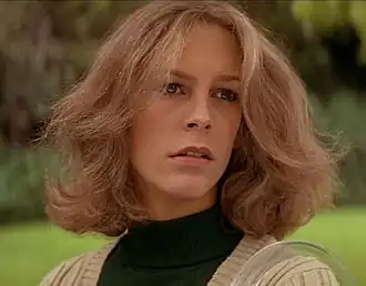 Лори Строуд в исполнении Джейми Ли Кёртис в фильме «Хэллоуин» (1978)